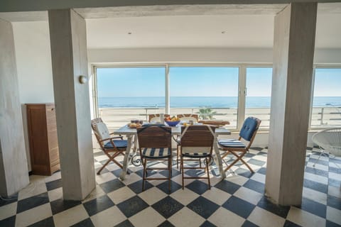 Natural landscape, View (from property/room), Living room, Dining area, Sea view