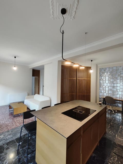 Kitchen or kitchenette, Living room, Seating area, Dining area