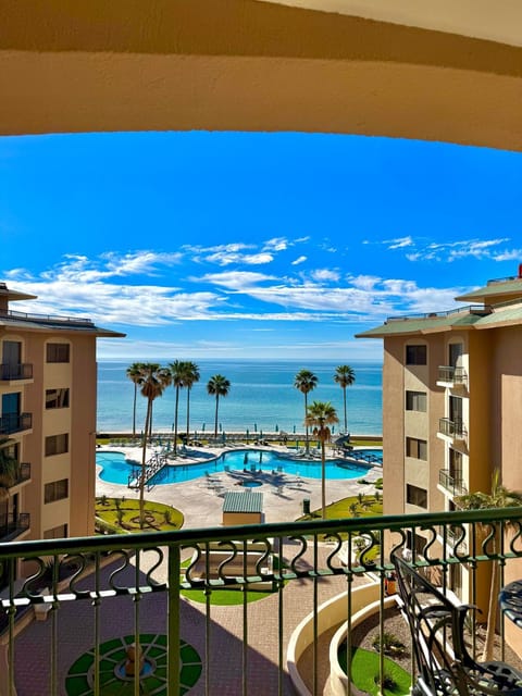 Property building, Patio, Day, Natural landscape, View (from property/room), Balcony/Terrace, Pool view, Sea view, Swimming pool