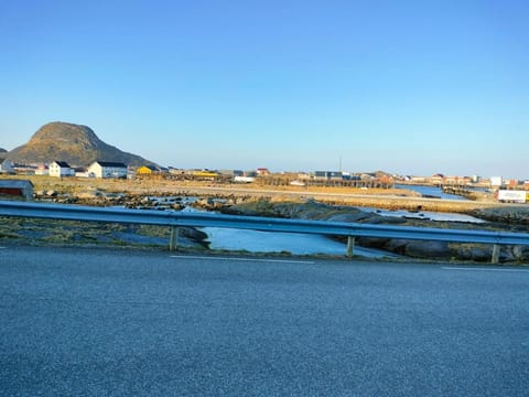 House on beautiful Værøy, mountains and sea outside the window House in Lofoten