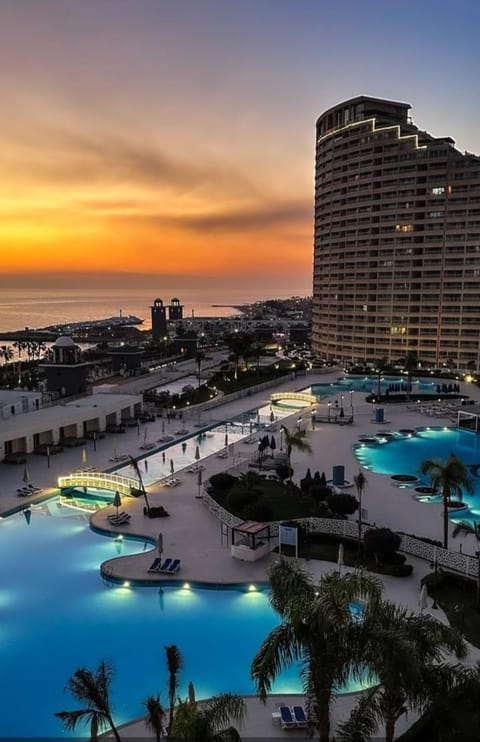 Property building, Natural landscape, View (from property/room), Balcony/Terrace, Beach, City view, Pool view, Swimming pool