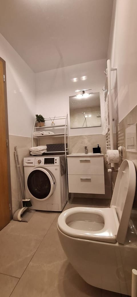 Bathroom, washing machine, dryer