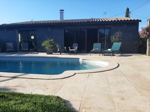 Property building, Patio, Swimming pool, sunbed