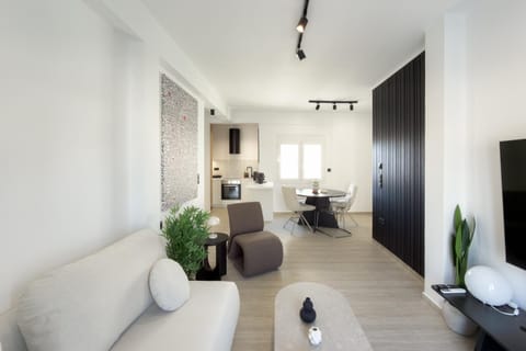 Kitchen or kitchenette, Living room, Seating area, Dining area