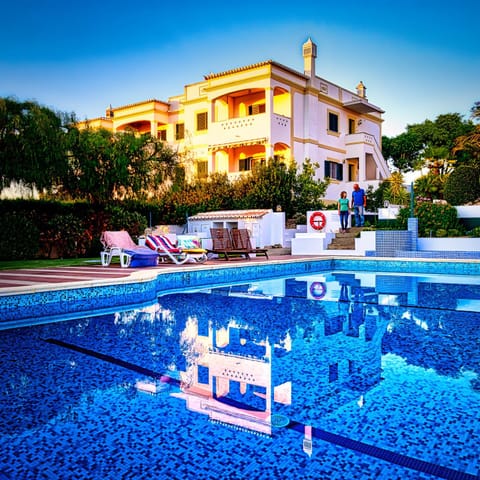 Property building, Living room, Swimming pool