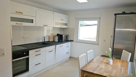 Kitchen or kitchenette, Dining area, dishwasher, oven, stove