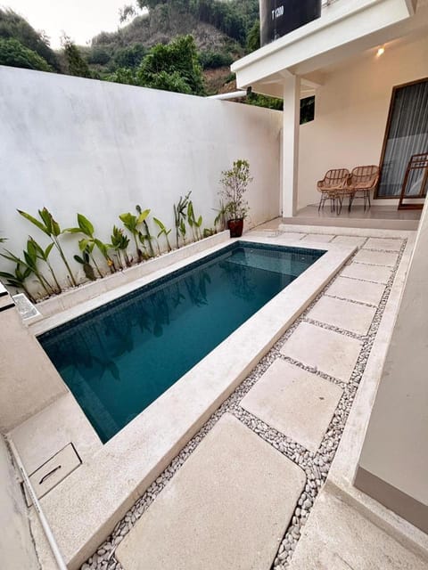 Facade/entrance, Off site, Day, Pool view, Swimming pool