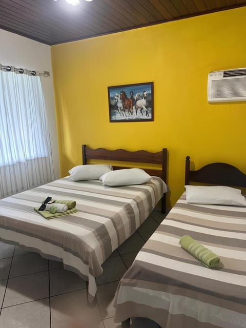 Bed, Photo of the whole room, Bedroom, towels, air conditioner