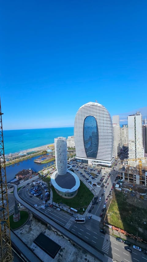 Property building, Nearby landmark, Day, Neighbourhood, Natural landscape, Bird's eye view, City view, Sea view, Location