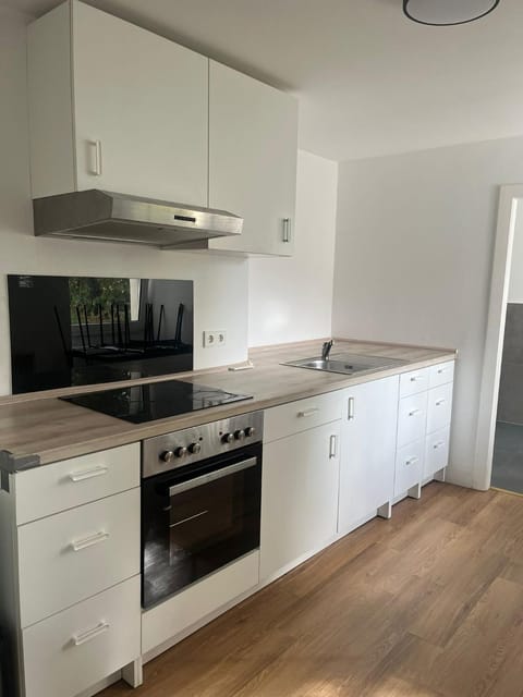 Kitchen or kitchenette, oven, stove