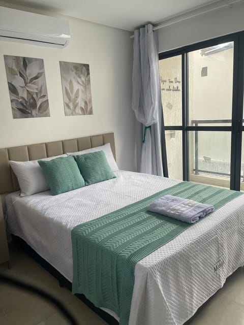 Bed, Photo of the whole room, Bedroom, towels, air conditioner