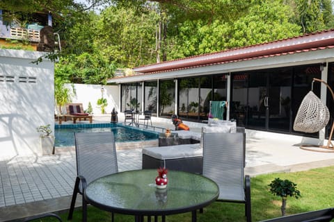 Property building, Garden, Garden, Seating area, Dining area, Garden view, Pool view, Swimming pool