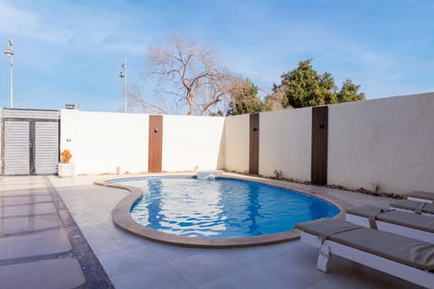 Patio, Day, Pool view, Swimming pool, sunbed