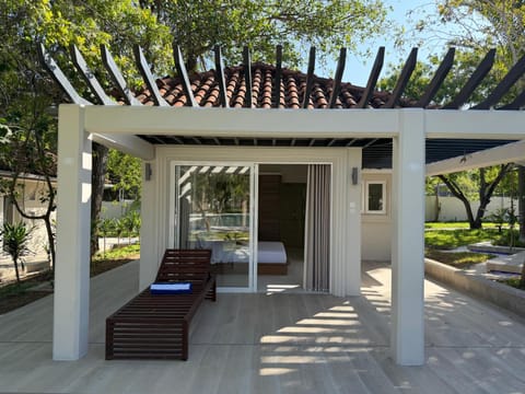 Property building, Patio, Spring, Day, Garden, View (from property/room), Garden view, sunbed