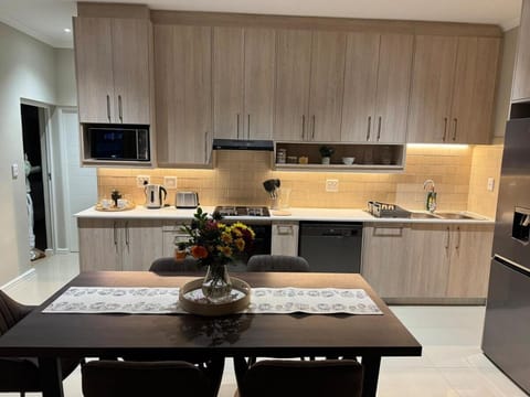 Kitchen or kitchenette, Dining area, dishwasher, oven, stove, toaster