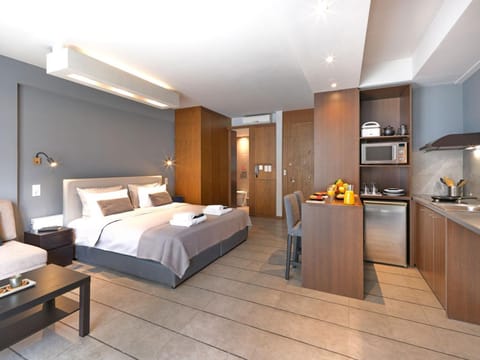 Bed, Coffee/tea facilities, Kitchen or kitchenette, Photo of the whole room, Dining area, Bedroom, oven, stove, wardrobe