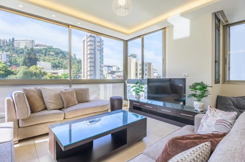 TV and multimedia, Living room, Seating area, City view