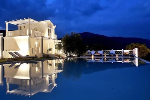 Property building, Night, Natural landscape, Mountain view, Pool view, Swimming pool, sunbed