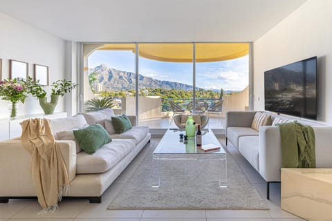 TV and multimedia, View (from property/room), Living room, Seating area, Mountain view, Sea view