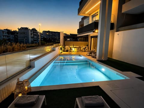 Property building, Night, Natural landscape, View (from property/room), Pool view, Swimming pool, sunbed