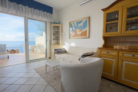 Natural landscape, Living room, Seating area, Dining area, Sea view