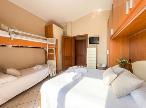 Bed, Photo of the whole room, Bedroom, bunk bed, towels, wardrobe