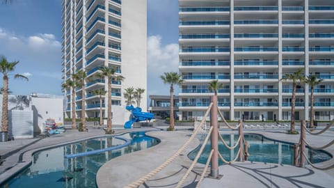 Property building, Day, Pool view, Swimming pool