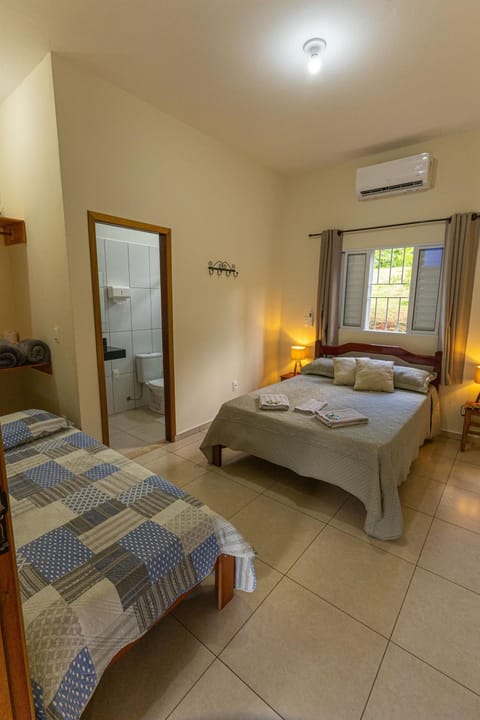 Bed, Photo of the whole room, towels, air conditioner