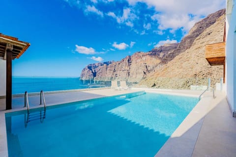 Property building, Living room, Swimming pool