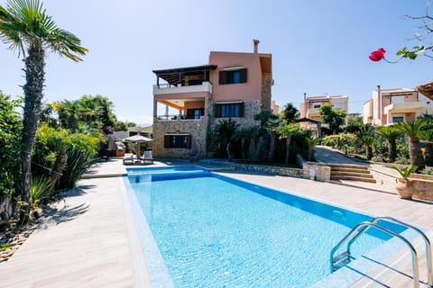Property building, Patio, Pool view, Swimming pool, Swimming pool, sunbed