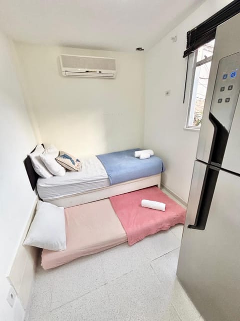 Bed, air conditioner