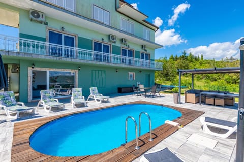 Property building, Patio, Day, Balcony/Terrace, Pool view, Swimming pool, sunbed