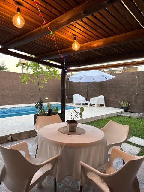 Patio, Day, Natural landscape, Living room, Seating area, Dining area, Pool view, Swimming pool, sunbed