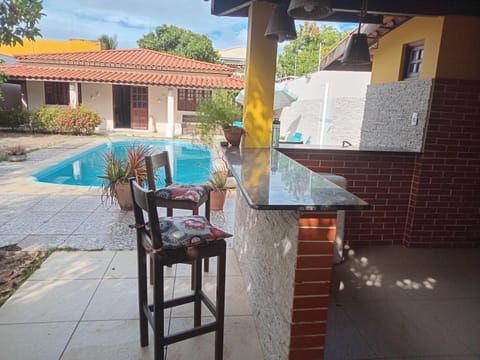 Shower, Property building, Patio, Day, Dining area, Pool view, Swimming pool