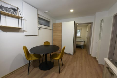 Kitchen or kitchenette, Living room, Seating area, Dining area