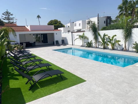 Patio, Pool view, sunbed