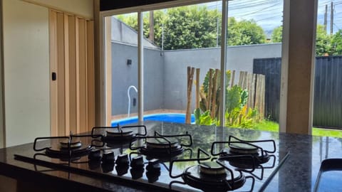 Kitchen or kitchenette, Garden view, Pool view
