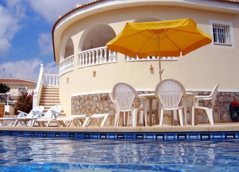 Property building, Patio, Balcony/Terrace, Pool view, Swimming pool, sunbed