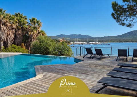 Property building, Day, Natural landscape, Pool view, Sea view, Swimming pool, sunbed