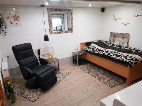 Bed, Living room, Seating area