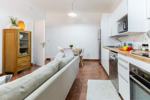 Kitchen or kitchenette, Living room, Seating area, Food, dishwasher, oven, stove