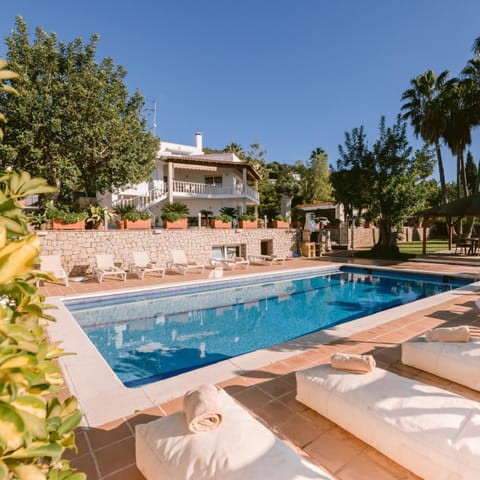 Property building, Living room, Swimming pool