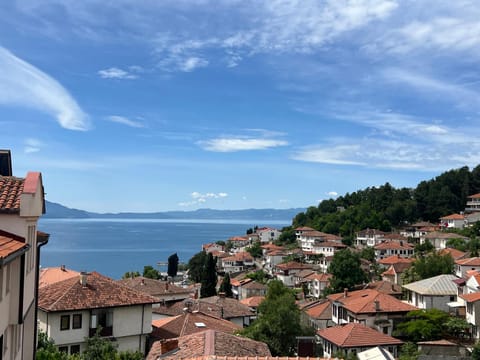 Property building, Nearby landmark, Natural landscape, City view, Sea view
