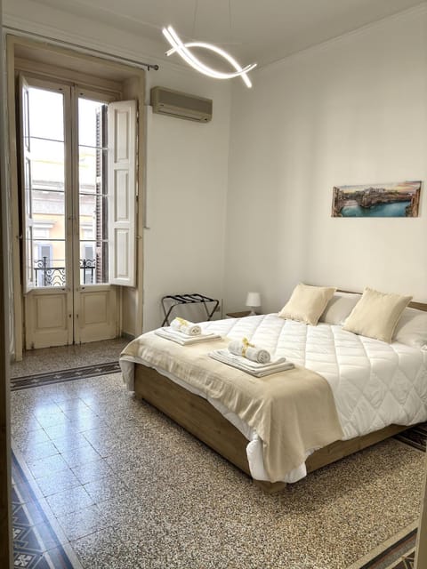 Bed, Photo of the whole room, Bedroom, towels, air conditioner