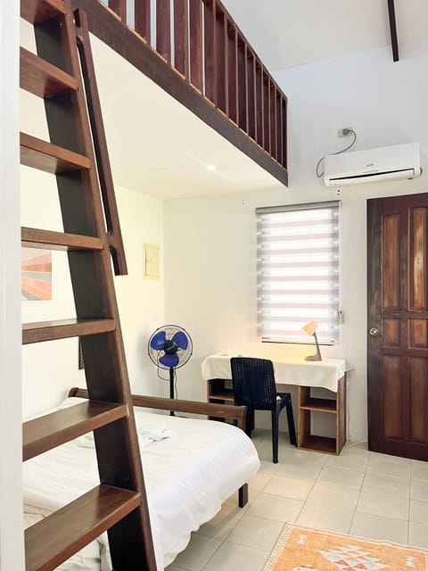 Bed, Photo of the whole room, Seating area, air conditioner