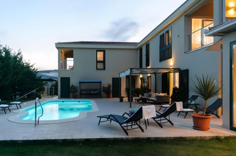 Property building, Patio, Swimming pool