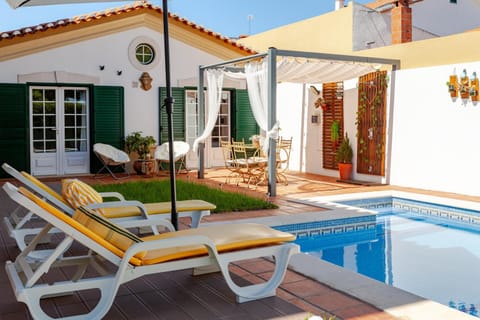 Property building, Living room, Swimming pool