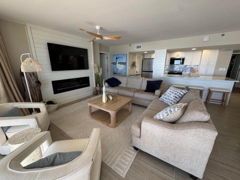 TV and multimedia, Kitchen or kitchenette, Living room, Seating area, fireplace, furniture