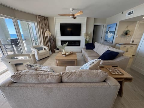 TV and multimedia, Balcony/Terrace, Living room, Seating area, Sea view, fireplace, furniture