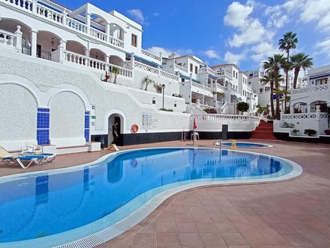Property building, Pool view, Swimming pool, sunbed